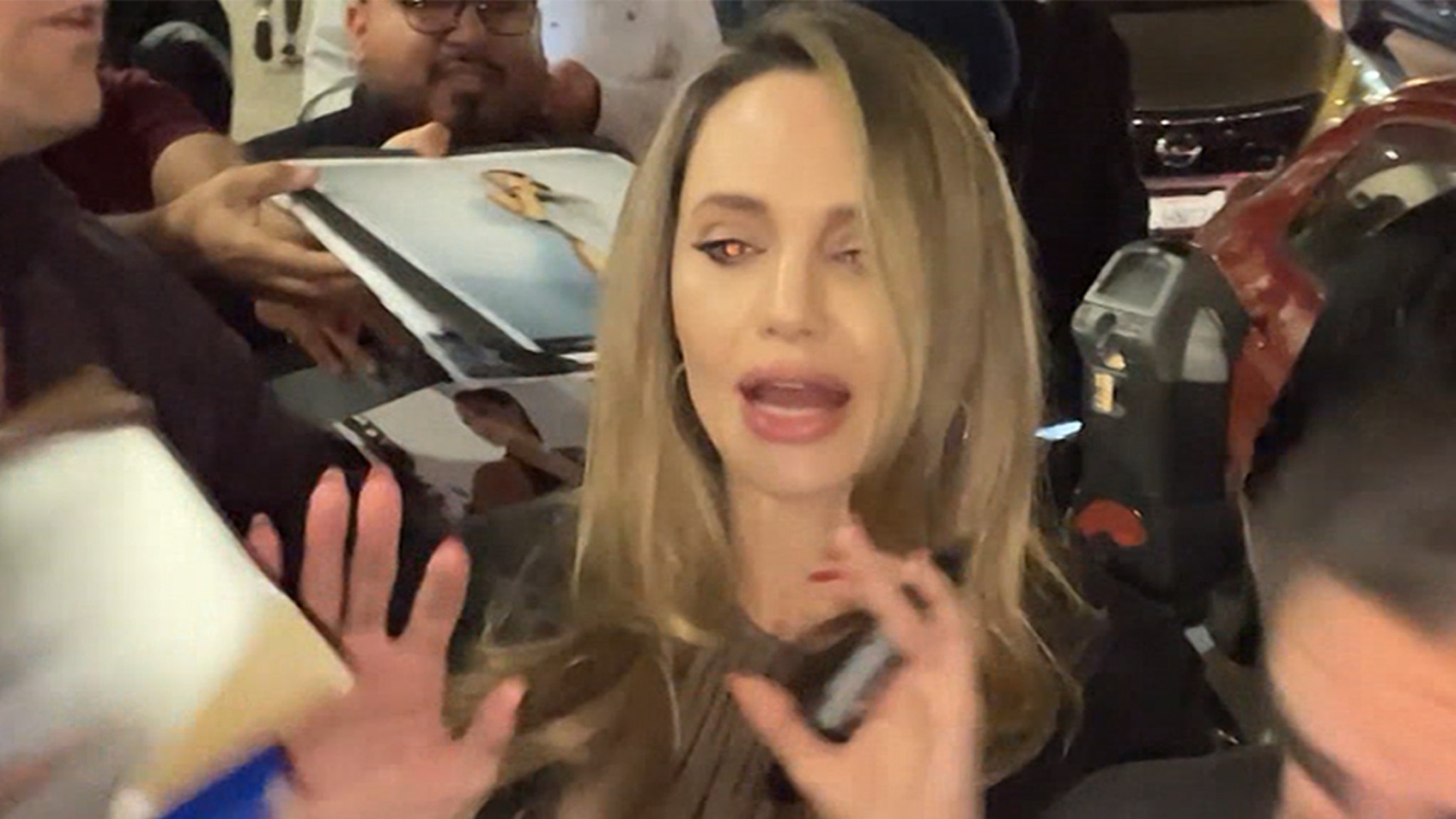 Angelina Jolie Overwhelmed as She’s Swarmed by Fans and Paparazzi