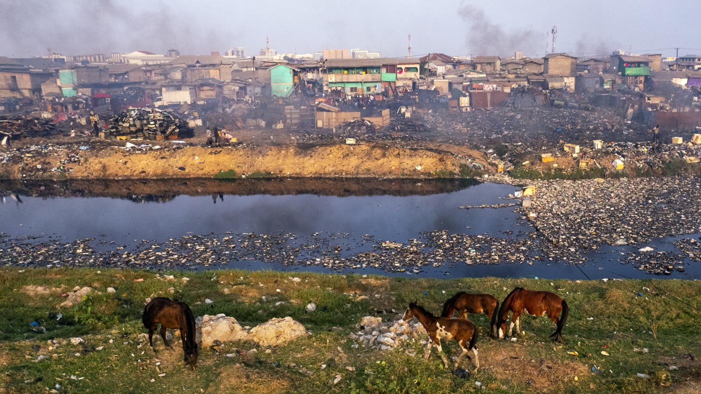 Stunning photos of a vast e-waste dumping ground — and those who make a living off it